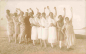 Preview: Bademode Frauen am Strand Echtfotokarte * ca. 1910