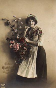 Woman with a basket of roses, birthday, no. 8969/6, used circa 1920