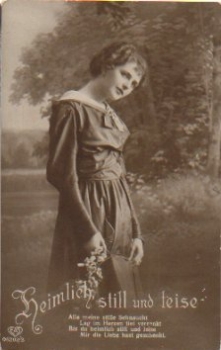 Woman with flowers serial card no. 05207/3 * ca. 1920