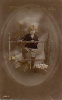 Child at a fence series card no. 6394/1 o 1923