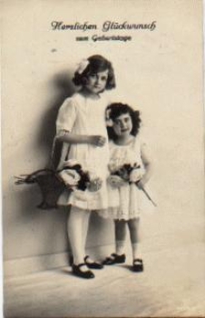 Children with roses birthday card ca. 1920