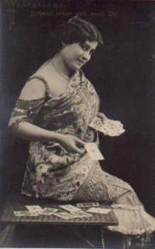 Woman with cards fortune teller series card 2634/4 * ca. 1920