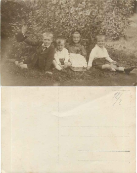 Children in the garden real photo card * ca. 1920