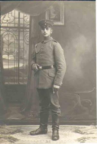 German soldier with rifle cord and acorn real photo postcard WW1 * ca. 1916