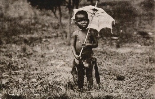 colored child with parasol * approx. 1920