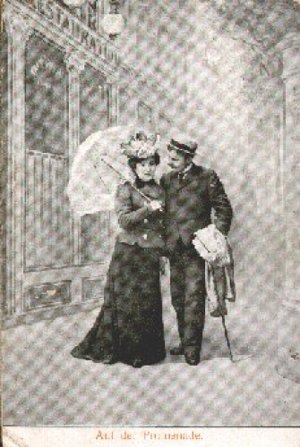 Woman and man with umbrella * ca. 1910