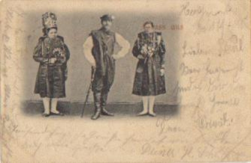 Man with two women traditional costumes o 1898
