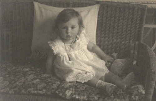 Girl with doll real photo card o February 13, 1914