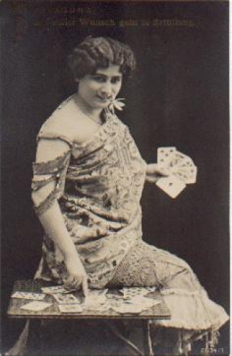 Woman with cards fortune teller series card 2634/1 * ca. 1920