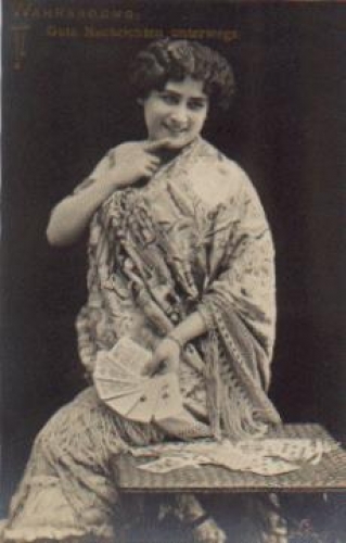 Woman with cards fortune teller series card 2634/2 * ca. 1920