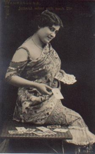 Woman with cards fortune teller series card 2634/4 * ca. 1920
