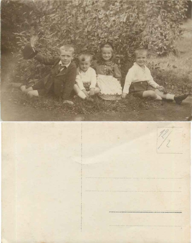 Children in the garden real photo card * ca. 1920