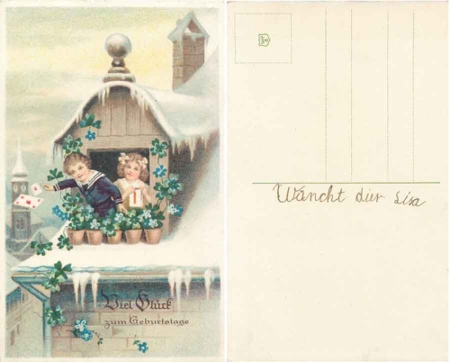 Children with shamrocks birthday card circa 1910