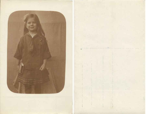 Girl with book real photo * ca. 1910