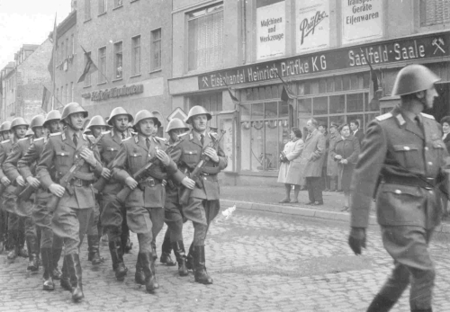 Saalfeld, Thuringia: NVA parade, circa 1970, real photograph, 10.6 x 7.4 cm.