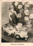 Doll with toy tractor * approx. 1959
