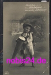 Beginning of school boy with bag of sugar satchel greeting card *ca.1913