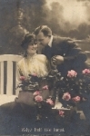 Loving couple with roses * ca. 1920