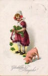 Girl feeds the pig with clover leaves, o 29.12.1927