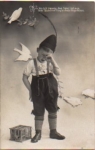 Boy with pigeon birdcage o 11/19/1911