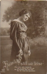 Woman with flowers serial card no. 05207/3 * ca. 1920