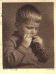 Boy with harmonica 