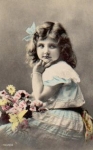 Girl with flowers Series card no. 1443/2 used. circa 1910