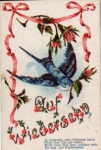 Swallow with a rose in its beak artist card used. circa 1920