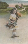 Child bouquet of flowers and basket silver embossed card series 3979, used. circa 1910