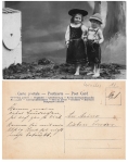 Boy with slingshot in traditional leather trousers used around 1905