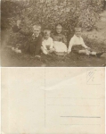 Children in the garden real photo card * ca. 1920