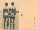 naked colored people back view with jewelry * ca.1920
